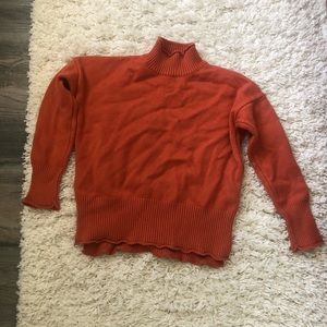 Orange turtle neck sweater